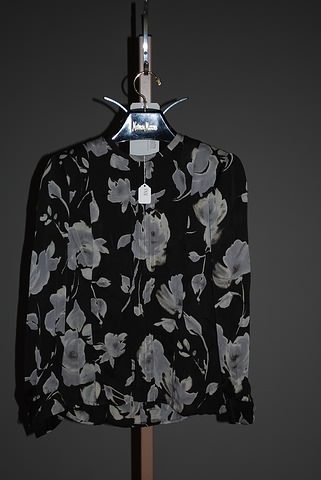 Appraisal: Andr Laug black silk long sleeve blouse with grey print