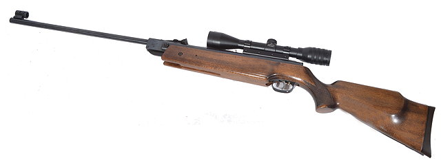 Appraisal: A WEIHRAUCH HW CALIBER BREAK BARREL AIR RIFLE with walnut