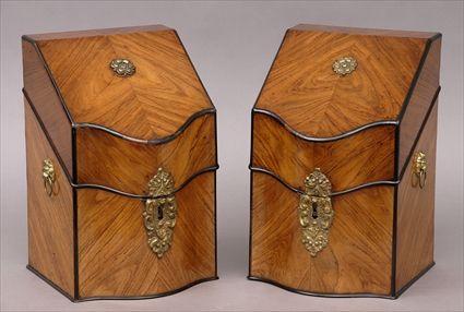 Appraisal: PAIR OF CONTINENTAL-STYLE BRASS-MOUNTED WALNUT CUTLERY BOXES Each serpentine fronted