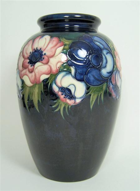 Appraisal: MOORCROFT BALUSTER VASE CIRCA glazed earthenware decorated in the 'Anemones'