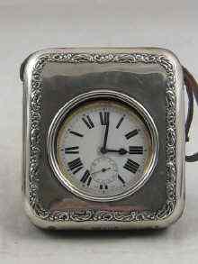 Appraisal: A Goliath watch in silver faced carrying case strut back