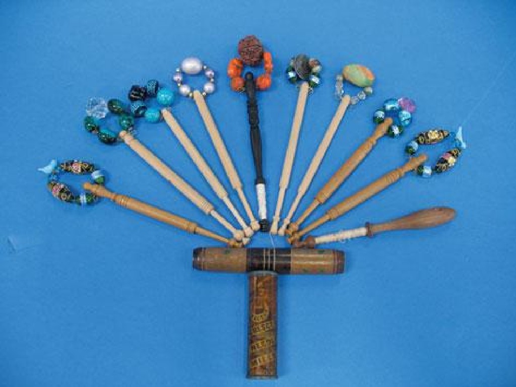 Appraisal: A COLLECTION OF LACE MAKERS BOBBINS including turned bobbins with