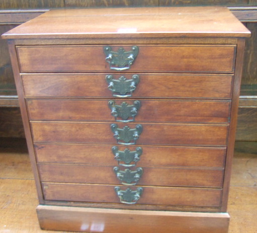 Appraisal: A late th century mahogany table top collectors chest of