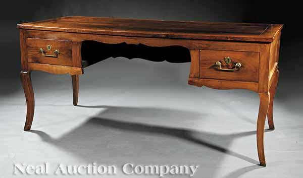 Appraisal: A French Provincial Fruitwood Bureau Plat rectangular top above a