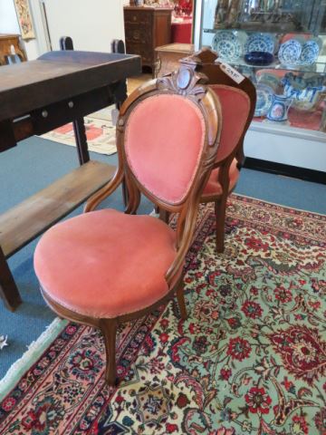 Appraisal: Pair of Carved Balloon Back Side Chairs light burgandy velvet