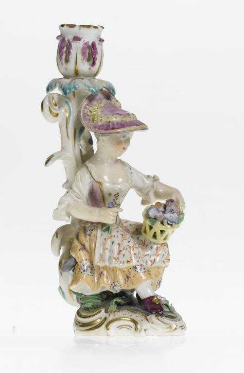 Appraisal: A DERBY GARDENER CANDLESTICK the seated girl in a pink