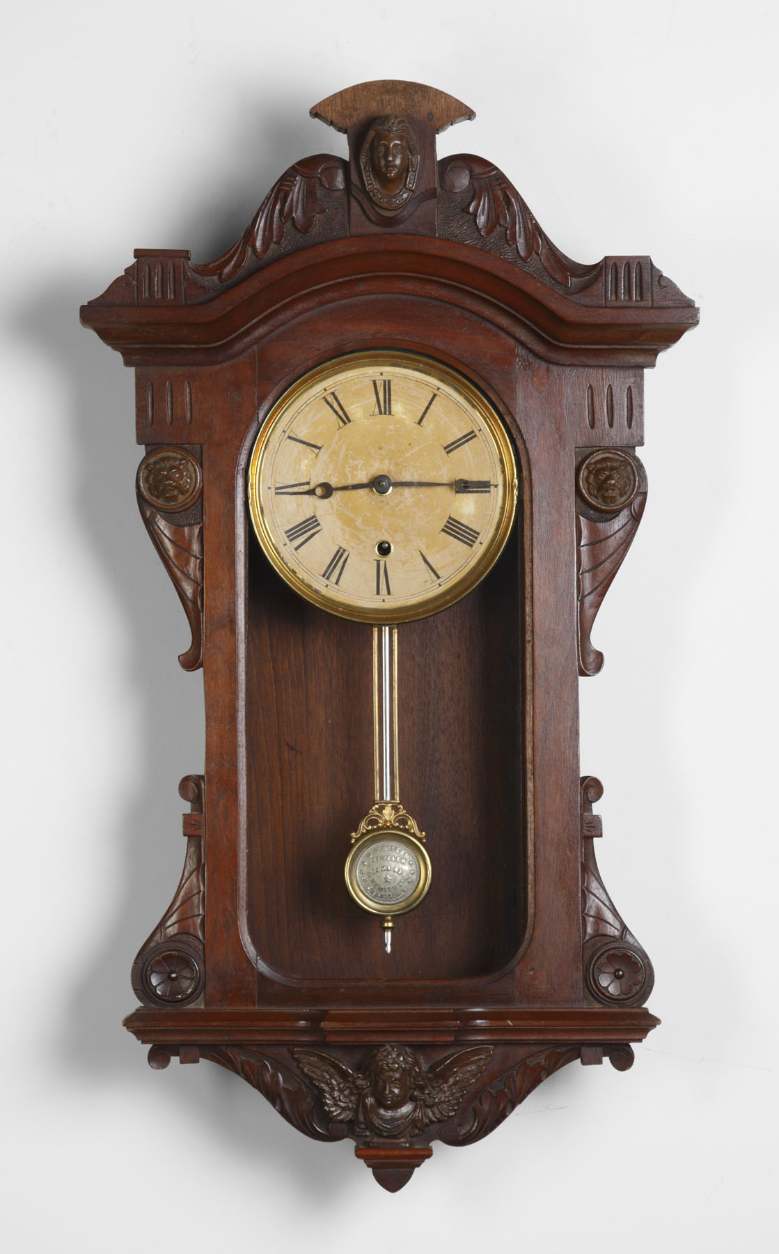 Appraisal: E N Welch Victorian Wall Clock Carved walnut case with