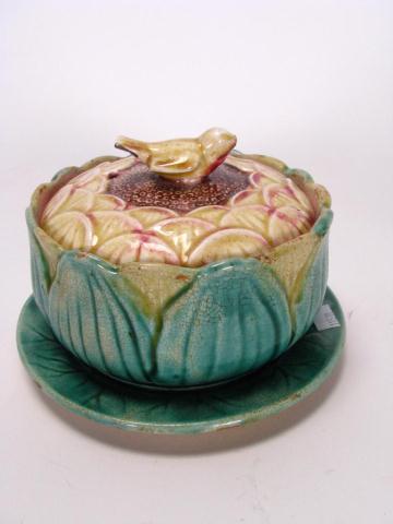 Appraisal: Majolica Lidded Sauce Bowl and Attached Underplate bird finial has