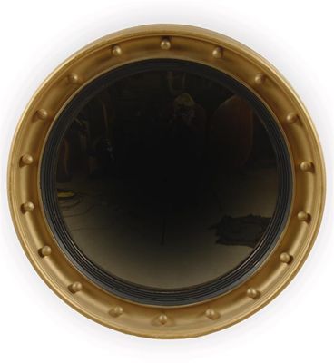 Appraisal: A Regency style giltwood convex mirror the ebonised slip to