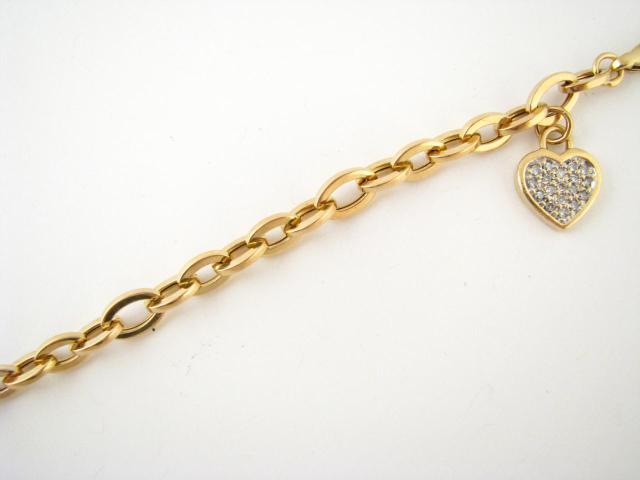 Appraisal: K yellow gold bracelet '' long with heart shaped diamond