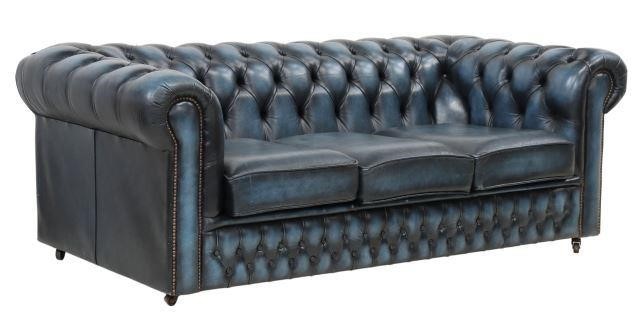 Appraisal: English Chesterfield three-seat sofa th c in blue leather upholstery