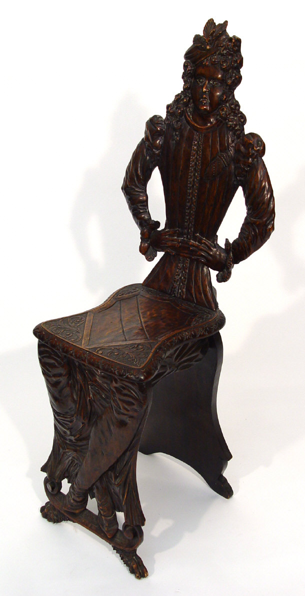 Appraisal: Mahogany hall chair carved with a figure with leaf carved