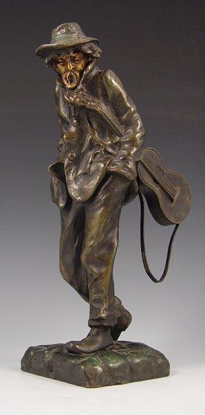 Appraisal: ROUSSEAU E European th C Roaming Guitarist Bronze '' h