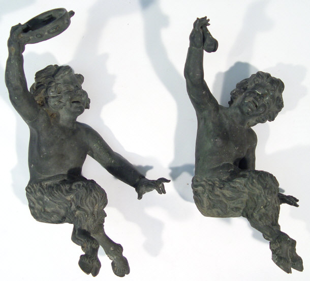 Appraisal: Two th Century bronze fawns with outstretched arms clutching a