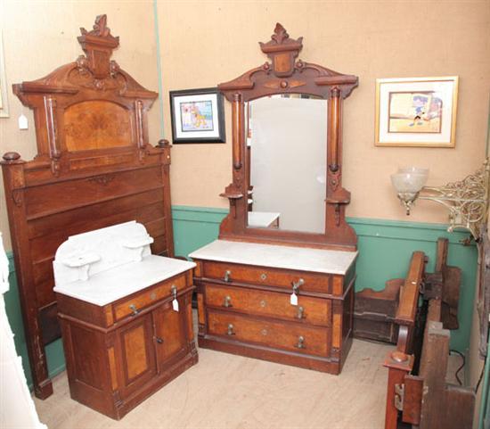 Appraisal: THREE PIECE VICTORIAN BEDROOM SET Walnut and consisting of a