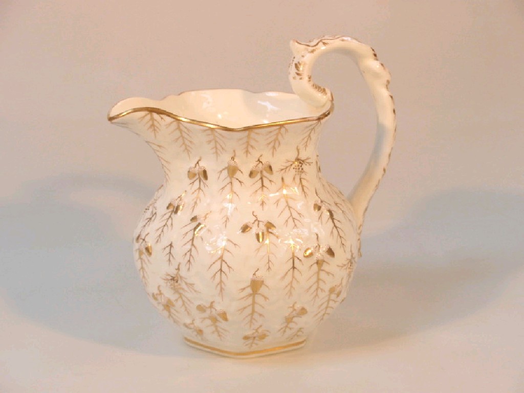 Appraisal: A thC Staffordshire porcelain leaf moulded jug of baluster form