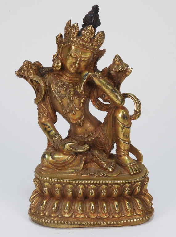 Appraisal: TIBETAN GILT BRONZE BUDDHA SCULPTURE Tibet th CenturyDepicts an ornate