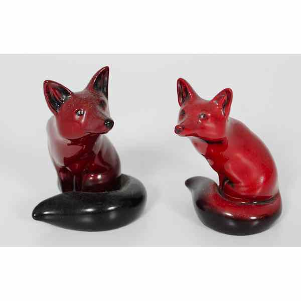 Appraisal: Royal Doulton Flambe Foxes British Two Royal Doulton flambe foxes