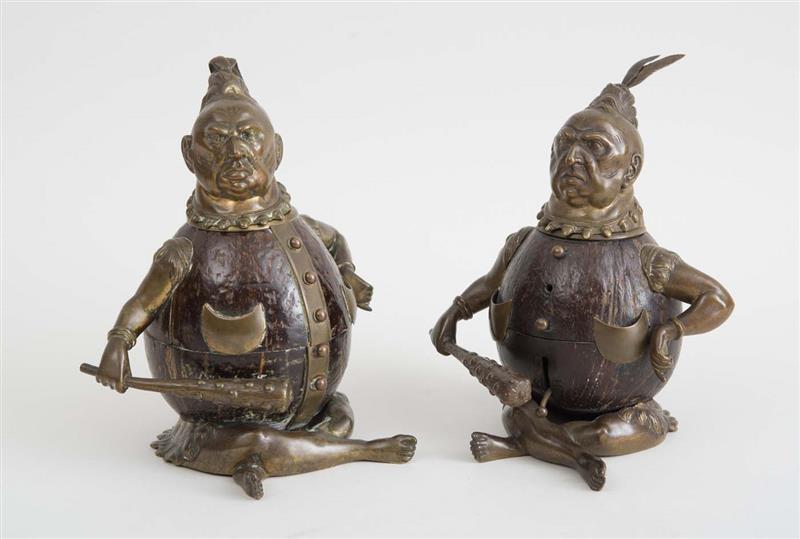 Appraisal: PAIR OF AMUSING BRASS-MOUNTED COCONUT INKWELLS EACH IN THE FORM