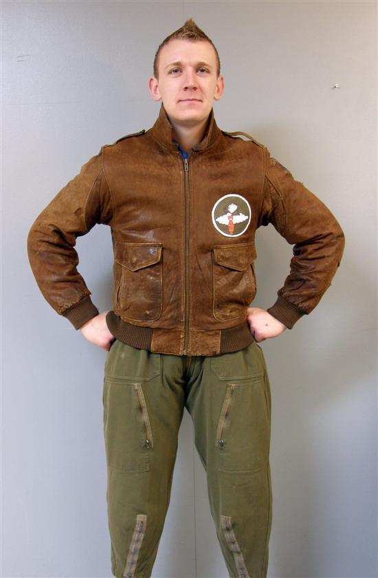 Appraisal: American military flying suit and personalised leather jacket Jacket with