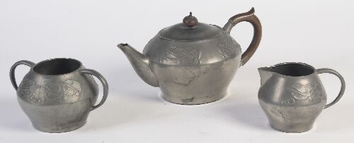 Appraisal: A Liberty Co 'Tudric' three piece pewter tea service designed