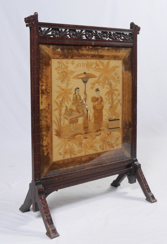 Appraisal: CARVED VICTORIAN ORIENTAL MOTIF FIRE SCREEN Frame with carved stylized