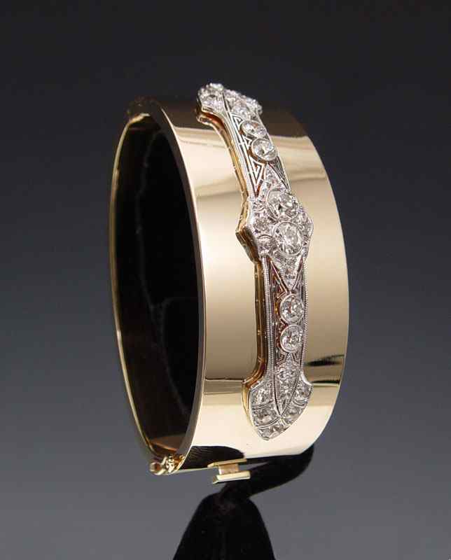 Appraisal: PLATINUM GOLD DIAMOND BANGLE BRACELET k yellow gold bangle bracelet