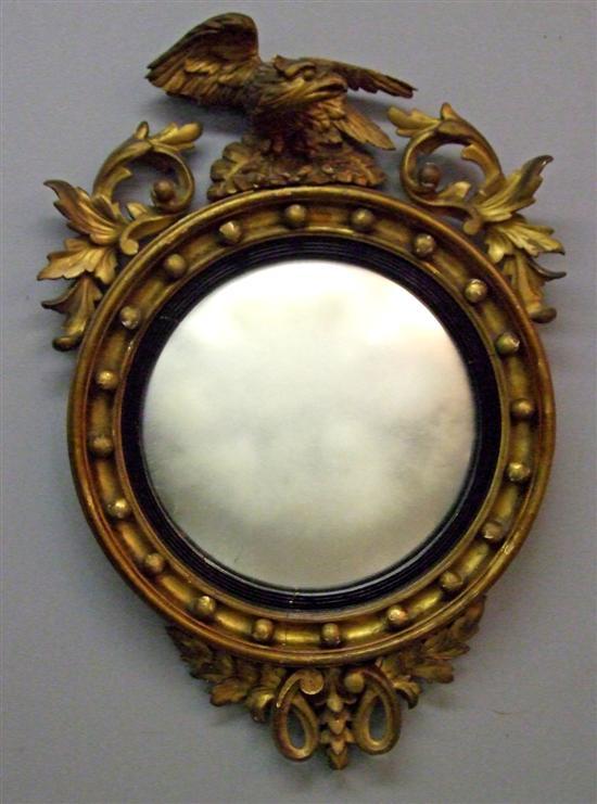 Appraisal: Regency carved giltwood convex wall mirror with foliate decoration and