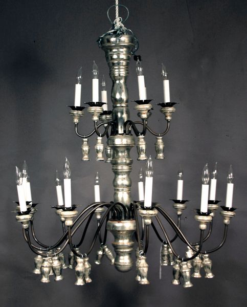 Appraisal: th Century carved wood chandelier with wrought iron arms and