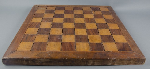 Appraisal: Primitive Walnut Chestnut Game BoardCirca Refinished wiht varnish spills at