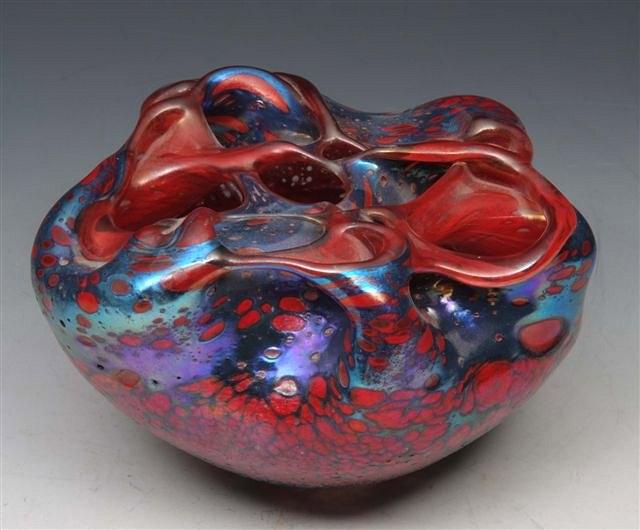 Appraisal: PETER LAYTON Czech b A free form glass vase decorated