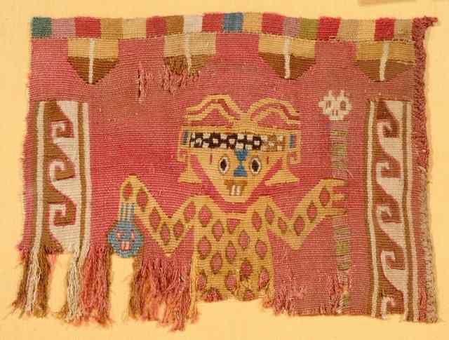 Appraisal: AN EARLY PERUVIAN CAMELID FIBRE FRAGMENT portraying a figure on