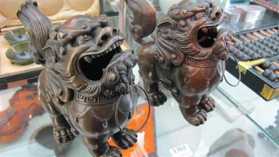 Appraisal: PAIR OF BRONZE FO DOG CENSERS