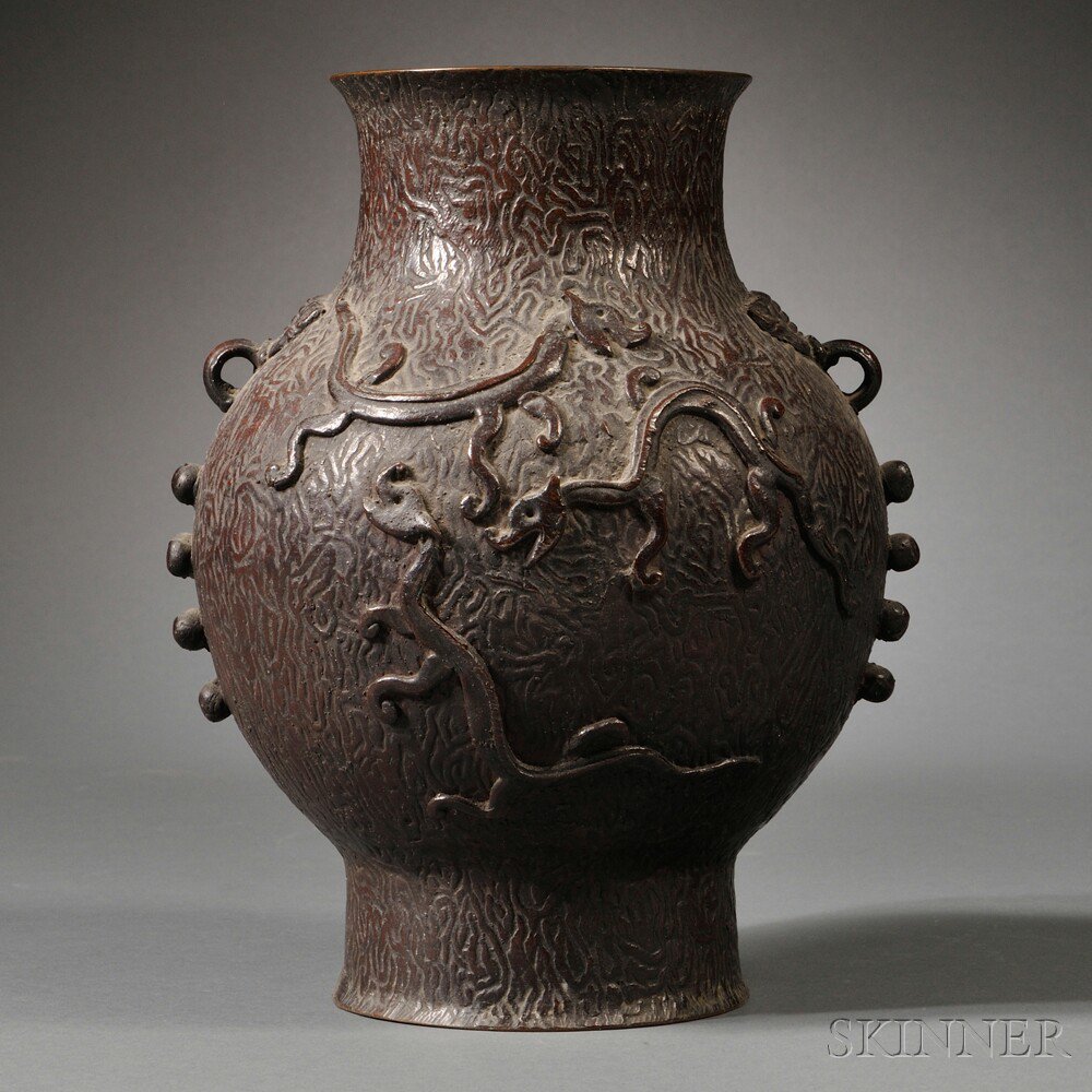 Appraisal: Bronze Vase China bottle shape rising from a tall recessed