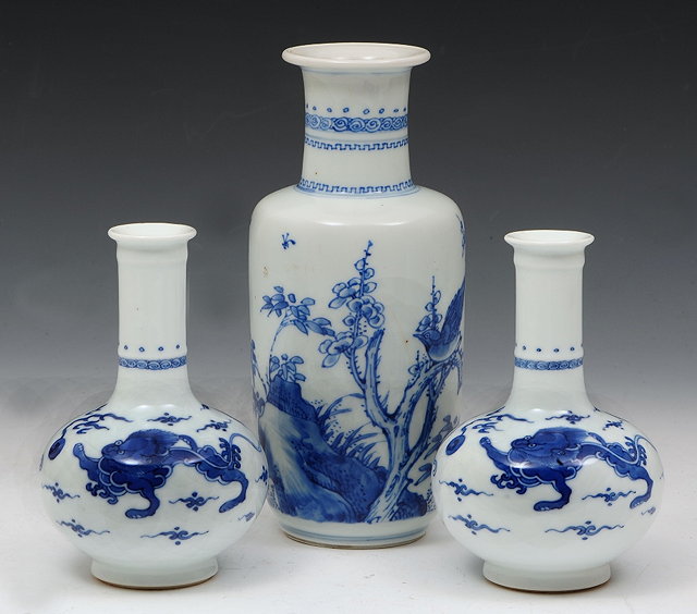 Appraisal: A CHINESE BLUE AND WHITE SMALL ROULEAU VASE with blossom