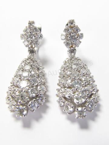 Appraisal: Elegant K white gold pave diamond drop earrings with over