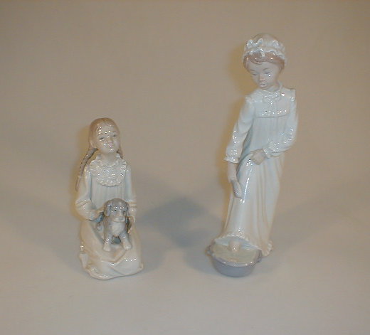 Appraisal: Two Nao by Lladro figures depicting a young girl in