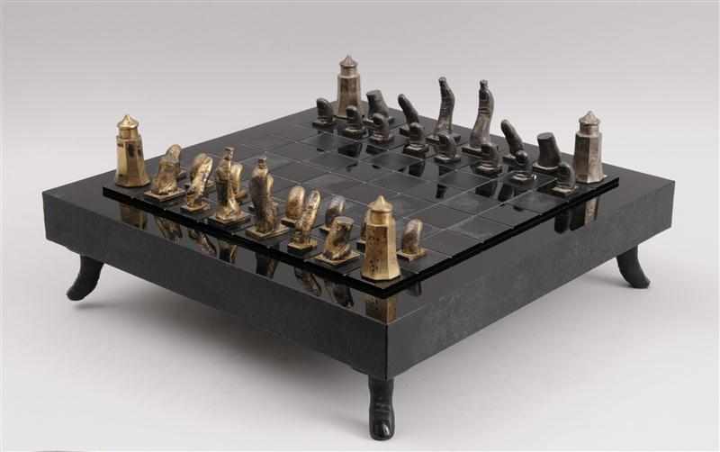 Appraisal: SALVADOR DALI DESIGNED CHESS SET With sterling appendage pieces on