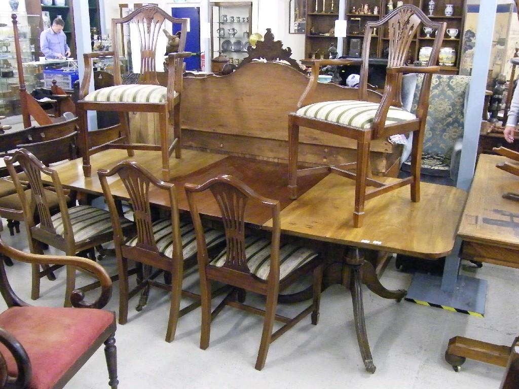 Appraisal: Georgian style twin pedestal mahogany dining table extended together with