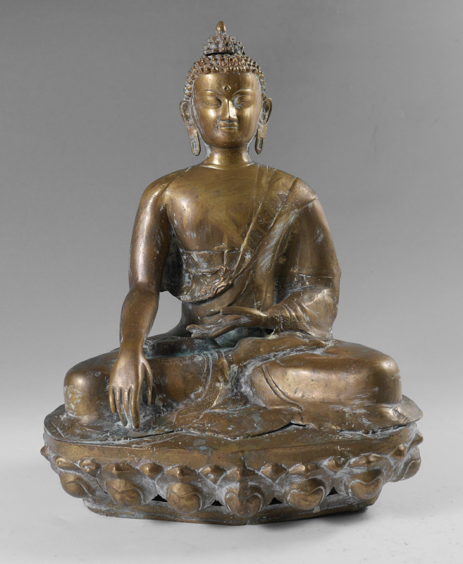 Appraisal: SOUTHEAST ASIAN BRASS SEATED BUDDHA FIGURE Figure of Buddha seated