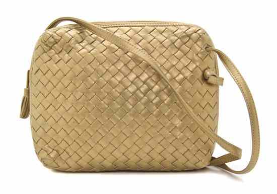 Appraisal: A Bottega Veneta Gold Leather Woven Purse with adjustable shoulder