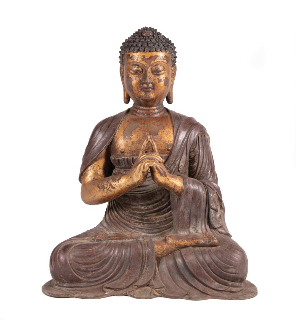 Appraisal: Chinese Gilt and Patinated Bronze Figure of Buddha modeled seated