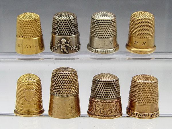 Appraisal: COLLECTION OF STERLING AND GOLD THIMBLES Size includes k gold