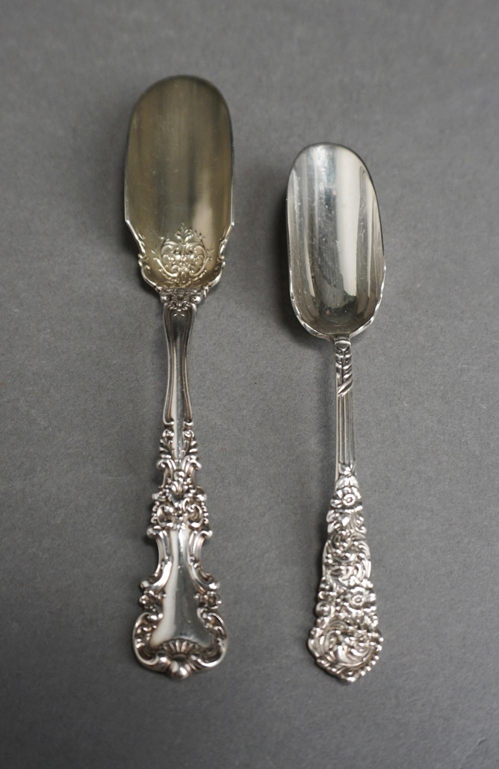 Appraisal: TWO AMERICAN STERLING SILVER CHEESE SCOOPS OZTTwo American Sterling Silver