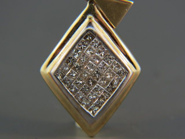 Appraisal: Diamond Pendant square brilliant diamonds invisible set totaling carat k