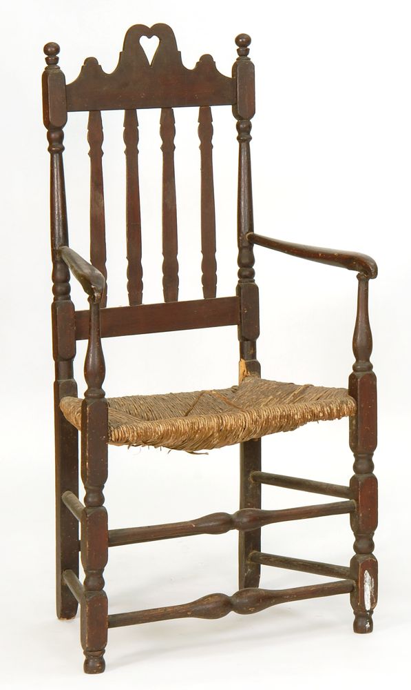 Appraisal: ANTIQUE AMERICAN BANISTERBACK RUSH-SEAT ARMCHAIR th CenturyWith old finish Pierced