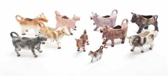 Appraisal: A Collection of Twenty-One Ceramic Cow Form Creamers of various