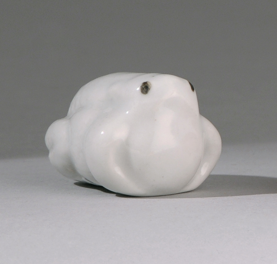 Appraisal: BLANC DE CHINE PORCELAIN NETSUKE Meiji PeriodIn the form of