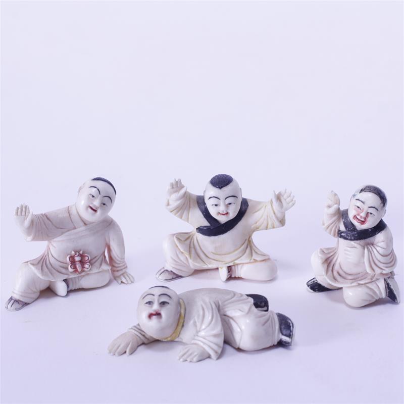 Appraisal: Four Chinese Carved Ivory and Polychrome Child Figures H x