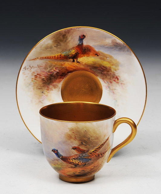 Appraisal: A ROYAL WORCESTER PORCELAIN PAINTED CUP and saucer by James